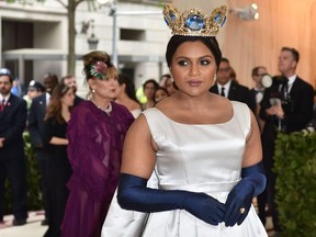 Actress Mindy Kaling arrives for the 2018 Met Gala on May 7, 2018, at the Metropolitan Museum of Art in New York. The Gala raises money for the Metropolitan Museum of Arts Costume Institute. The Gala's 2018 theme is Heavenly Bodies: Fashion and the Catholic Imagination.
