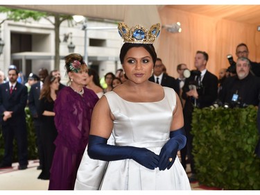 Actress Mindy Kaling arrives for the 2018 Met Gala on May 7, 2018, at the Metropolitan Museum of Art in New York. The Gala raises money for the Metropolitan Museum of Arts Costume Institute. The Gala's 2018 theme is Heavenly Bodies: Fashion and the Catholic Imagination.