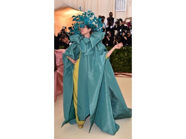 Frances McDormand  arrives for the 2018 Met Gala on May 7, 2018, at the Metropolitan Museum of Art in New York. The Gala raises money for the Metropolitan Museum of Arts Costume Institute. The Gala's 2018 theme is Heavenly Bodies: Fashion and the Catholic Imagination.