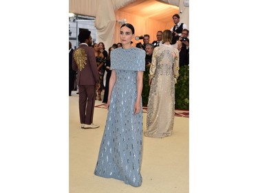 Rooney Mara arrives for the 2018 Met Gala on May 7, 2018, at the Metropolitan Museum of Art in New York. The Gala raises money for the Metropolitan Museum of Arts Costume Institute. The Gala's 2018 theme is Heavenly Bodies: Fashion and the Catholic Imagination.