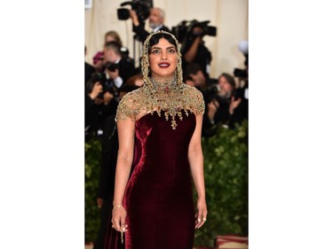 Priyanka Chopra arrives for the 2018 Met Gala on May 7, 2018, at the Metropolitan Museum of Art in New York. The Gala raises money for the Metropolitan Museum of Arts Costume Institute. The Gala's 2018 theme is Heavenly Bodies: Fashion and the Catholic Imagination.