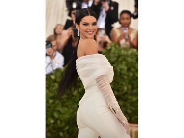 Kendall Jenner arrives for the 2018 Met Gala on May 7, 2018 at the Metropolitan Museum of Art in New York. The Gala raises money for the Metropolitan Museum of Arts Costume Institute. The Gala's 2018 theme is Heavenly Bodies: Fashion and the Catholic Imagination.