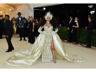 Cardi B arrives for the 2018 Met Gala on May 7, 2018, at the Metropolitan Museum of Art in New York. The Gala raises money for the Metropolitan Museum of Arts Costume Institute. The Gala's 2018 theme is Heavenly Bodies: Fashion and the Catholic Imagination.