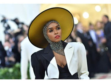Janelle Monae arrives for the 2018 Met Gala on May 7, 2018, at the Metropolitan Museum of Art in New York. The Gala raises money for the Metropolitan Museum of Arts Costume Institute. The Gala's 2018 theme is Heavenly Bodies: Fashion and the Catholic Imagination.