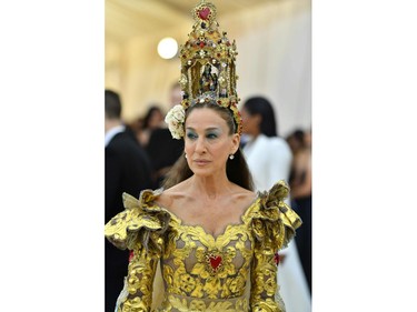Sarah Jessica Parker arrives for the 2018 Met Gala on May 7, 2018, at the Metropolitan Museum of Art in New York. The Gala raises money for the Metropolitan Museum of Arts Costume Institute. The Gala's 2018 theme is Heavenly Bodies: Fashion and the Catholic Imagination.
