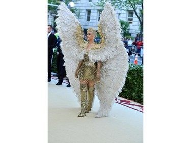 Katy Perry arrives for the 2018 Met Gala on May 7, 2018, at the Metropolitan Museum of Art in New York. The Gala raises money for the Metropolitan Museum of Arts Costume Institute. The Gala's 2018 theme is Heavenly Bodies: Fashion and the Catholic Imagination.