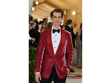 Andrew Garfield arrives for the 2018 Met Gala on May 7, 2018, at the Metropolitan Museum of Art in New York. The Gala raises money for the Metropolitan Museum of Arts Costume Institute. The Gala's 2018 theme is Heavenly Bodies: Fashion and the Catholic Imagination.