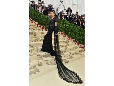 Bella Hadid arrives for the 2018 Met Gala on May 7, 2018, at the Metropolitan Museum of Art in New York. The Gala raises money for the Metropolitan Museum of Arts Costume Institute. The Gala's 2018 theme is Heavenly Bodies: Fashion and the Catholic Imagination.