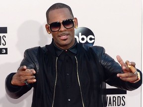 In this file photo taken on November 24, 2013 singer R. Kelly arrives for the 2013 American Music Awards in Los Angeles.