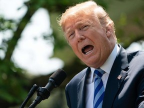 US President Donald Trump delivers remarks on reducing drug costs in the Rose Garden at the White House in Washington, DC, on May 11, 2018.