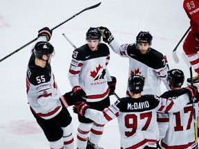 Canada's players celebrate after Ryan Nugent-Hopkins scored during the during the quarterfinal match Russia vs Canada of the 2018 IIHF Ice Hockey World Championship at the Royal Arena in Copenhagen, Denmark, on May 17, 2018. (Getty Images)