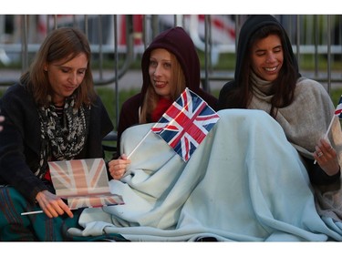 Royal fans wake up on the Long Walk leading to Windsor Castle ahead of the wedding and carriage procession of Britain's Prince Harry and Meghan Markle in Windsor, on May 19, 2018.