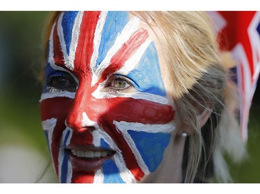 Well-wishers arrive on the Long Walk leading to Windsor Castle ahead of the wedding and carriage procession of Britain's Prince Harry and Meghan Markle in Windsor, on May 19, 2018.