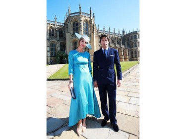 Argentine photographer and model Delfina Blaquier and Argentine polo player Nacho Figueras pose on arrival for the wedding ceremony of Britain's Prince Harry and US actress Meghan Markle at St George's Chapel, Windsor Castle, in Windsor, on May 19, 2018.