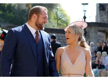 England rugby international James Haskell and Chloe Madeley arrive for the wedding ceremony of Britain's Prince Harry, Duke of Sussex and US actress Meghan Markle at St George's Chapel, Windsor Castle, in Windsor, on May 19, 2018.