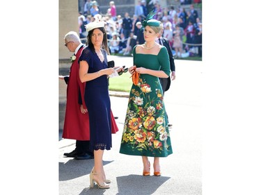 Kitty Spencer (R) arrives for the wedding ceremony of Britain's Prince Harry, Duke of Sussex and US actress Meghan Markle at St George's Chapel, Windsor Castle, in Windsor, on May 19, 2018.