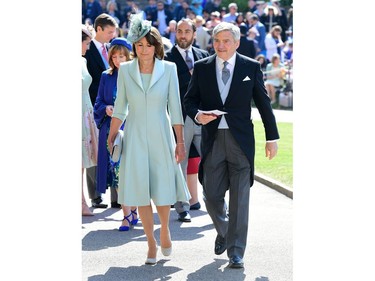 Carol Middleton and Michael Francis Middleton arrive for the wedding ceremony of Britain's Prince Harry, Duke of Sussex and US actress Meghan Markle at St George's Chapel, Windsor Castle, in Windsor, on May 19, 2018.