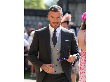 Former England footballer David Beckham arrives for the wedding ceremony of Britain's Prince Harry, Duke of Sussex and US actress Meghan Markle at St George's Chapel, Windsor Castle, in Windsor, on May 19, 2018.