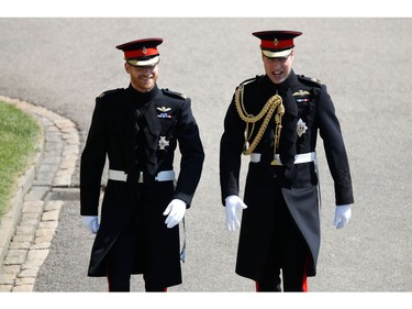 Britain's Prince Harry (L), Duke of Sussex, arrives with his best man Prince William, Duke of Cambridge (R), at St George's Chapel, Windsor Castle, in Windsor, on May 19, 2018 for his wedding ceremony to marry US actress Meghan Markle.