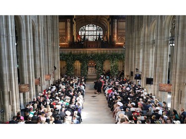 Guests are pictured as they take their seats inside the Chapel ahead of the wedding ceremony of Britain's Prince Harry, Duke of Sussex and US actress Meghan Markle in St George's Chapel, Windsor Castle, in Windsor, on May 19, 2018.