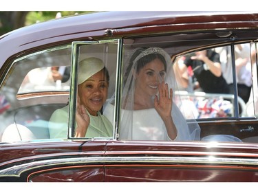 Meghan Markle (R) and her mother, Doria Ragland, arrive for her wedding ceremony to marry Britain's Prince Harry, Duke of Sussex, at St George's Chapel, Windsor Castle, in Windsor, on May 19, 2018.