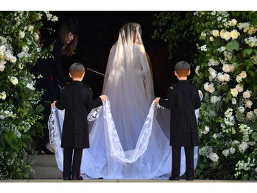 US actress Meghan Markle arrives for the wedding ceremony to marry Britain's Prince Harry, Duke of Sussex, at St George's Chapel, Windsor Castle, in Windsor, on May 19, 2018.