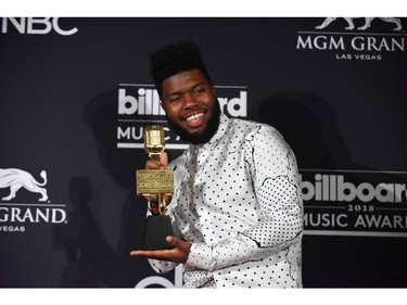 Recording artist Khalid poses with his award in the Press Room during the 2018 Billboard Music Awards 2018 at the MGM Grand Resort International on May 20, 2018 in Las Vegas, Nevada.