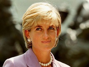 This file photo taken on June 17, 1997 shows Britain's Diana, Princess of Wales (L), at a ceremony at Red Cross headquarters in Washington, to call for a global ban on anti-personnel landmines.