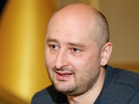 Russian journalist Arkady Babchenko speaks during an interview with foreign media in Kiev, Ukraine,
