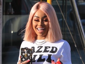 Blac Chyna gets into her white Ferrari while out and about in Brentwood, Calif., on April 20, 2018.