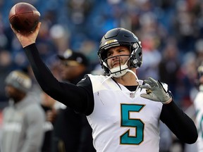 In this Jan. 21, 2018 file photo, Jacksonville Jaguars quarterback Blake Bortles (5) warms up before the AFC championship NFL football game against the New England Patriots in Foxborough, Mass. (AP Photo/David J. Phillip, file)