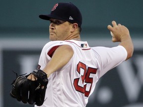 In this April 12, 2017, file photo, Boston Red Sox starting pitcher Steven Wright delivers to the Baltimore Orioles at Fenway Park in Boston. (AP Photo/Elise Amendola, File)
