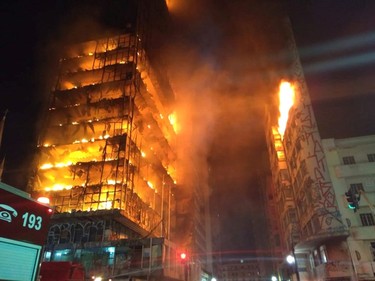 In this photo released by Sao Paulo Fire Department, a building on fire is seen in Sao Paulo, Brazil, Tuesday, May 1, 2018.