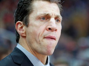In this Feb. 10, 2018, file photo, Carolina Hurricanes assistant coach Rod Brind'Amour watches from the bench during the first period of an NHL hockey game against the Colorado Avalanche, in Raleigh, N.C.