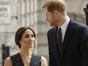 Britain's Prince Harry and his fiancee Meghan Markle arrive to attend a Memorial Service to commemorate the 25th anniversary of the murder of black teenager Stephen Lawrence at St Martin-in-the-Fields church in London, Monday, April 23, 2018.