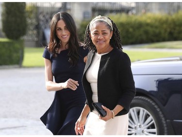 Meghan Markle, left and her mother, Doria Ragland, arrive at Cliveden House Hotel, in Berkshire, England, to spend the night before her wedding to Prince Harry on Saturday. (Steve Parsons/Pool Photo via AP) ORG XMIT: LON801