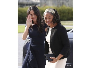 Meghan Markle, left and her mother, Doria Ragland, arrive at Cliveden House Hotel, in Berkshire, England, to spend the night before her wedding to Prince Harry on Saturday. (Steve Parsons/Pool Photo via AP) ORG XMIT: LON802