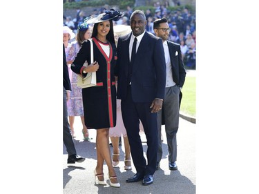 Idris Elba and Sabrina Dhowre arrive at St George's Chapel at Windsor Castle the wedding ceremony of Prince Harry and Meghan Markle at St. George's Chapel in Windsor Castle in Windsor, near London, England, Saturday, May 19, 2018. (Ian West/pool photo via AP) ORG XMIT: RWW109