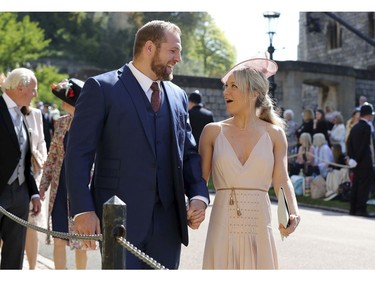 James Haskell and Chloe Madeley arrive for the wedding ceremony of Prince Harry and Meghan Markle at St. George's Chapel in Windsor Castle in Windsor, near London, England, Saturday, May 19, 2018. (Gareth Fuller/pool photo via AP) ORG XMIT: RWW116