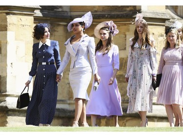 Abigail Spencer, foreground left and Priyanka Chopra arrive for the wedding ceremony of Prince Harry and Meghan Markle at St. George's Chapel in Windsor Castle in Windsor, near London, England, Saturday, May 19, 2018. (Chris Jackson/pool photo via AP) ORG XMIT: RWW555