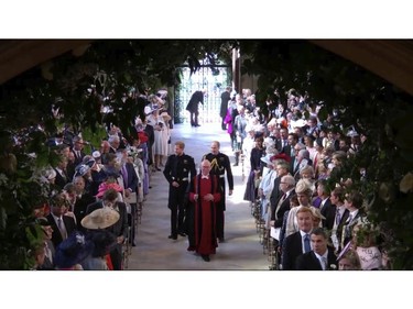 In this frame from video, Britain's Prince Harry and best man Prince William arrive for the wedding ceremony at St. George's Chapel in Windsor Castle in Windsor, near London, England, Saturday, May 19, 2018. (UK Pool/Sky News via AP) ORG XMIT: NYAG102