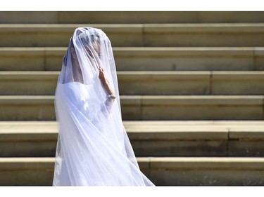 Meghan Markle arrives for her wedding at St. George's Chapel in Windsor Castle in Windsor, near London, England, Saturday, May 19, 2018. (Ben Stansall/pool photo via AP) ORG XMIT: RWW850