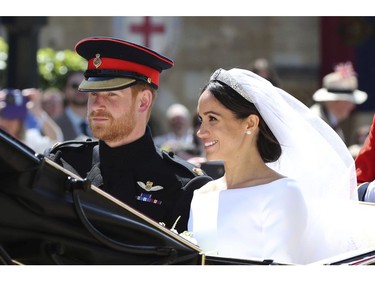 Meghan Markle and Prince Harry leave after their wedding ceremony, at St. George's Chapel in Windsor Castle in Windsor, near London, England, Saturday, May 19, 2018. (Gareth Fuller/pool photo via AP) ORG XMIT: RWW630