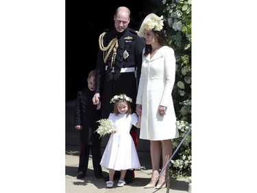 Britain's Prince William and Kate, Duchess of Cambridge with Prince George and Princess Charlotte leave after the wedding ceremony of Prince Harry and Meghan Markle at St. George's Chapel in Windsor Castle in Windsor, near London, England, Saturday, May 19, 2018. (Andrew Matthews/pool photo via AP) ORG XMIT: RWW2021