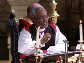 In this frame from video, the Most Rev. Michael Bruce Curry speaks during the wedding ceremony of Britain's Prince Harry and Meghan Markle at St. George's Chapel in Windsor Castle in Windsor, near London, England, Saturday, May 19, 2018.  (UK Pool/Sky News via AP)