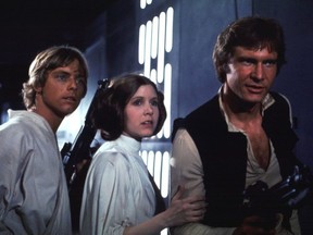 Luke Skywalker (Mark Hamill), Princess Leia (Carrie Fisher), and Han Solo (Harrison Ford)(Photo, handout).