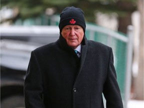 Robin Camp walks into a reinstatement hearing at the Law Society of Alberta offices in Calgary on Tuesday.