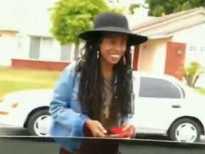 Donisha Prendergast, the granddaughter of Bob Marley, is seen on video talking to police after a possible burglary call on April 30. (Facebook)