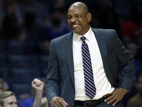 Los Angeles Clippers head coach Doc Rivers smiles during the second half of a preseason NBA game against the Portland Trail Blazers, in Los Angeles on Oct. 8, 2017. (AP Photo/Alex Gallardo)
