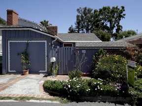 This tiny cottage on Lombardy Lane in Laguna Beach, Calif. is for sale at just shy of $1 millions is shown Friday, May 25, 2018. (AP Photo/Chris Carlson)